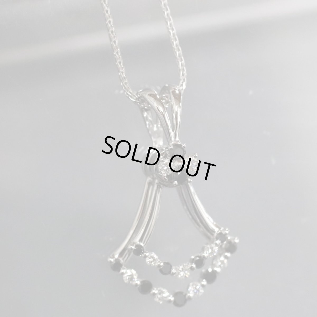 画像1: K18WGブラックダイヤモンドダンシングペンダント D0.26 BkD0.36 6.8g (1)