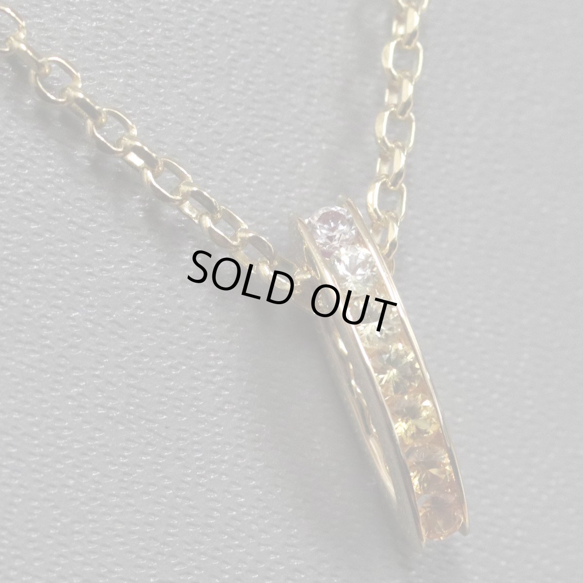 画像2: K18YG/750サファイアペンダント S0.56 3.4g (2)