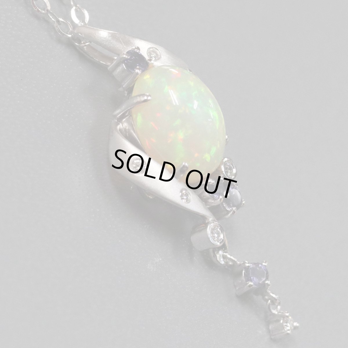 画像2: 若林佐代子 K18WGオパールダイヤモンドタンザナイトペンダント O3.13 D0.10 6.1g AJ付44cm 保証書 (2)