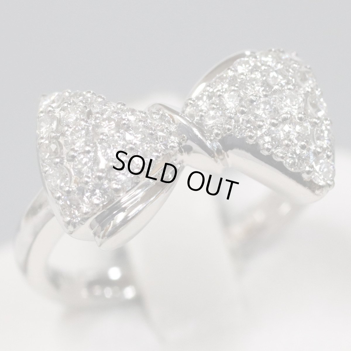 画像1: Pt900ダイヤモンドリング リボンモチーフ D0.54 7.7g #12.5 (1)