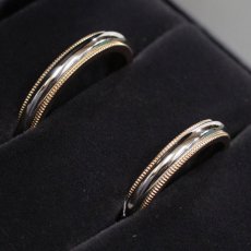 画像1: 750/Pt950 トゥギャザー ミルグレイン バンド リング 計11.2g #9 #15 内外箱 (1)